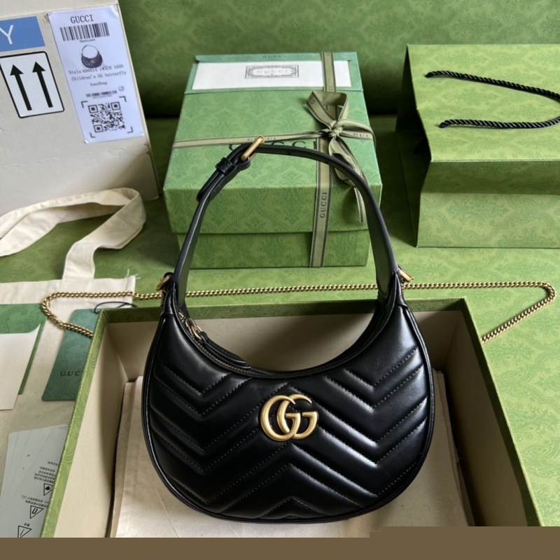 G*u*i top handle bags